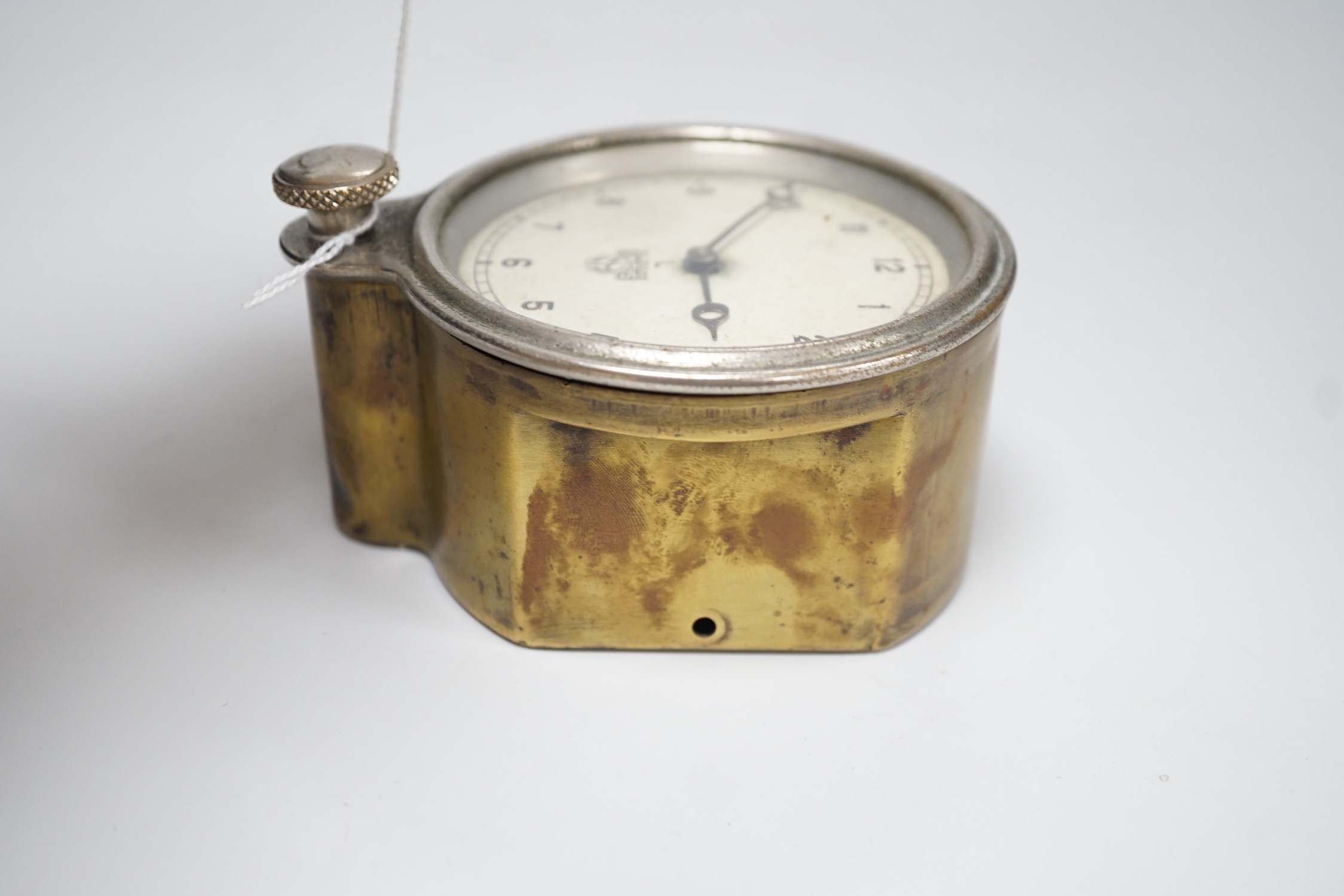 A Smiths MA 8day lever escapement front wind car clock with restoration paperwork, 9cm diam. overall